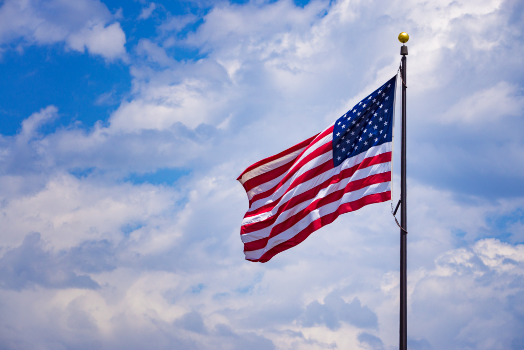 American Flag Flying with Sky Backdrop