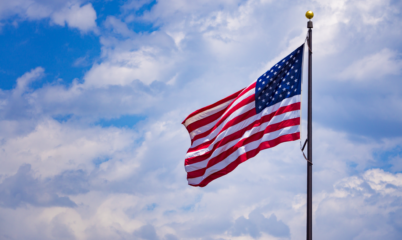American Flag Flying with Sky Backdrop