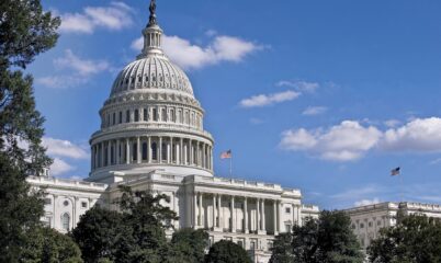 Medium Shot of Capitol Building with American Flag
