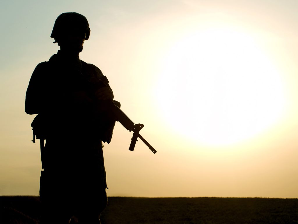 American Soldier Silhouette looking at Sunset