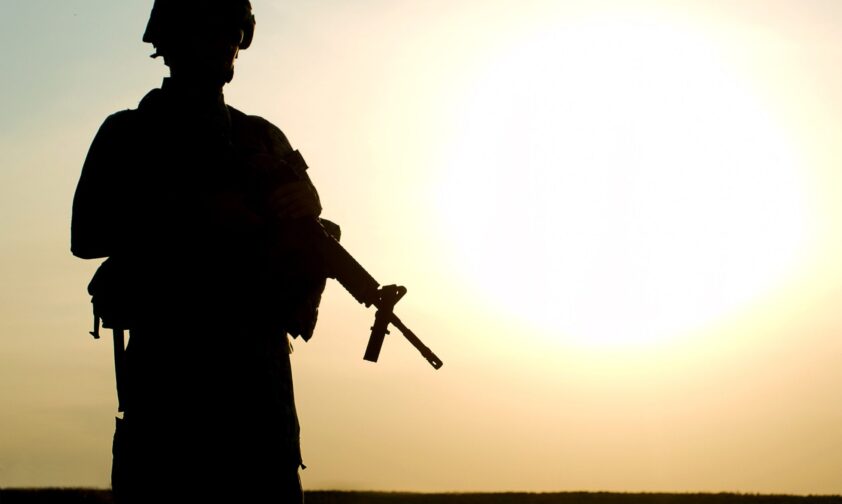 American Soldier Silhouette looking at Sunset
