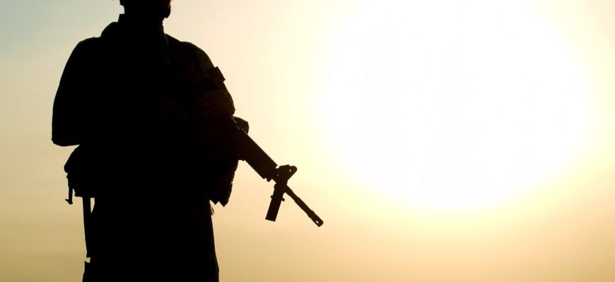 American Soldier Silhouette looking at Sunset