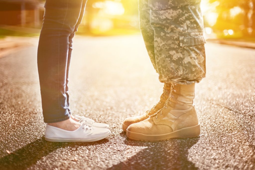 Soldier facing Woman after Tour of Duty