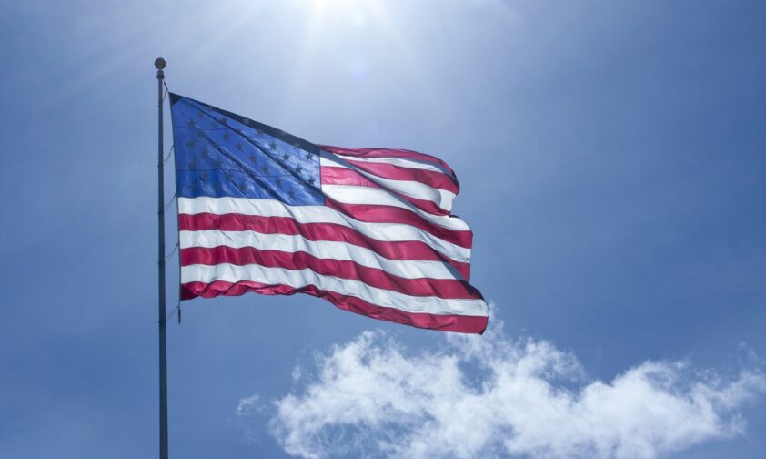 American Flag Flying with Sky Backdrop