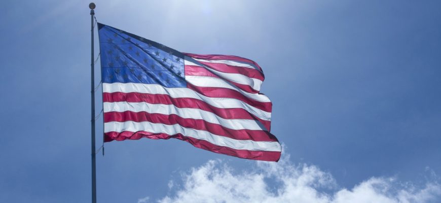 American Flag Flying with Sky Backdrop