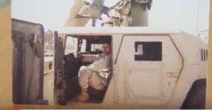 Soldier in Humvee, Sandy Background