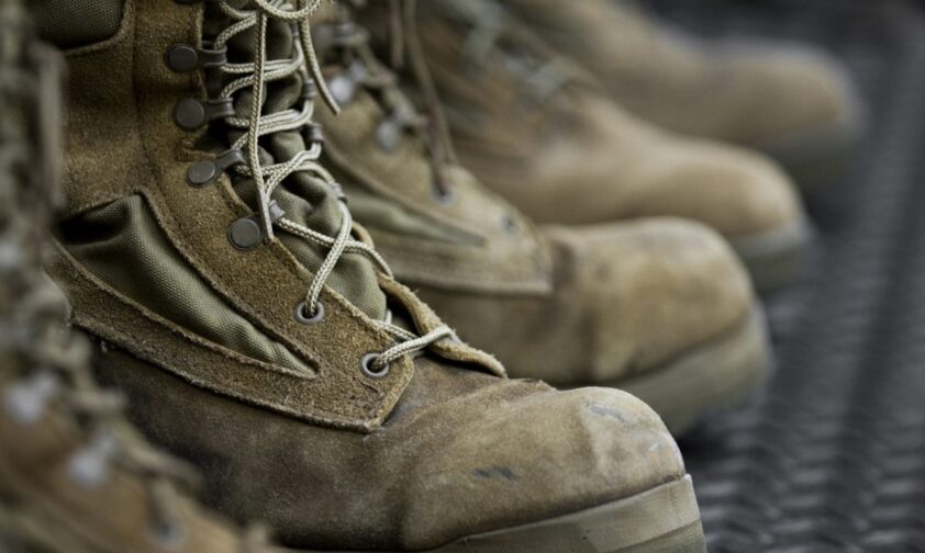 Close up of Veteran's Boots on the Ground