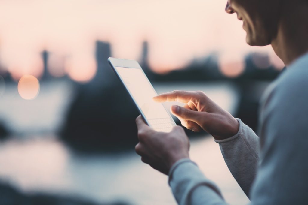 Man Pointing at Tablet