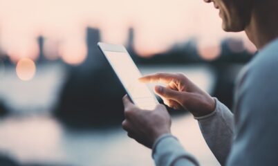 Man Pointing at Tablet