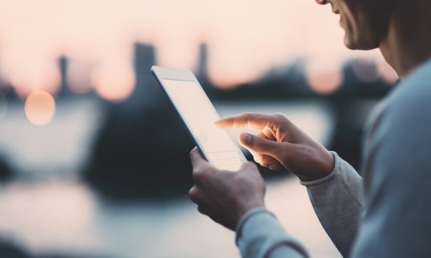 Man Pointing at Tablet