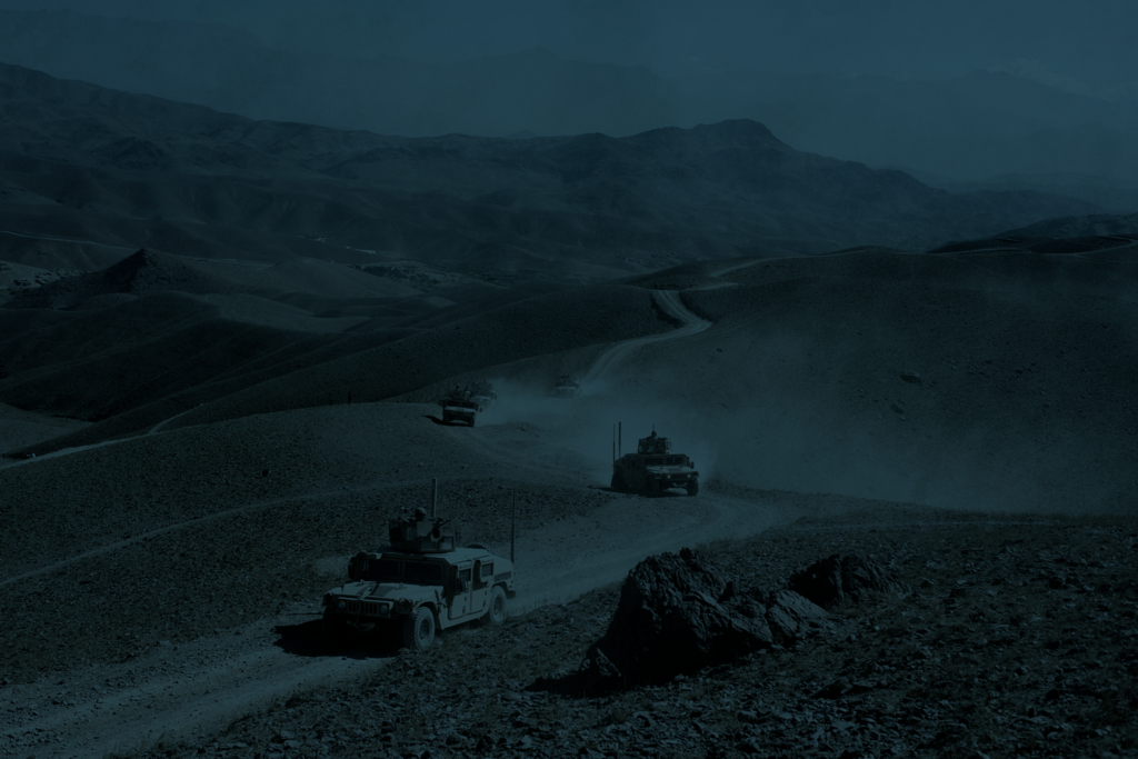 Humvees Driving Down Afghanistan Road