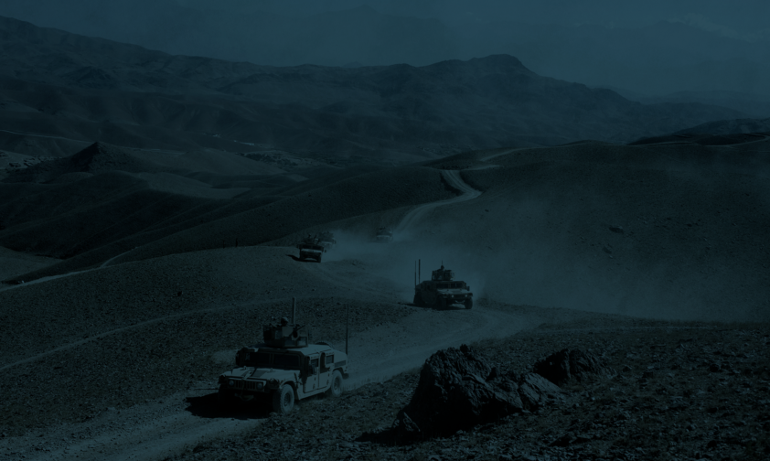 Humvees Driving Down Afghanistan Road