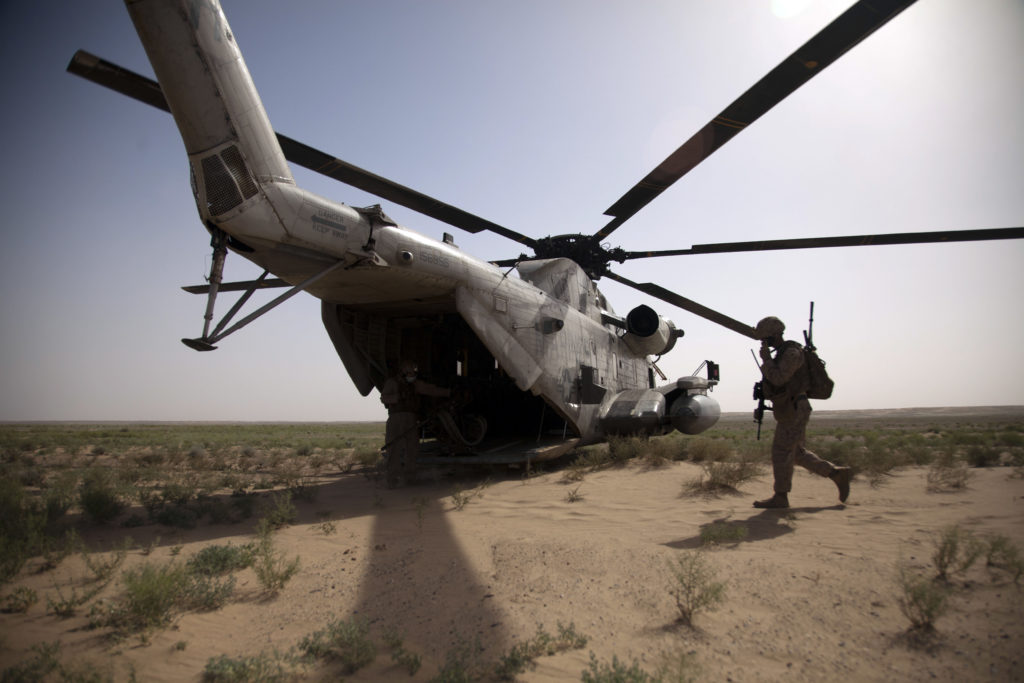 US Military Helicopter with Soldier