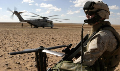 US Military Helicopters with Soldier on Patrol