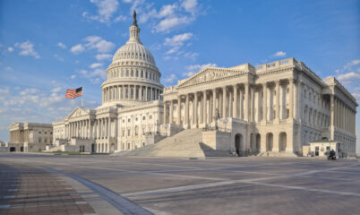 Wide Shot of Capitol Building and American Flag