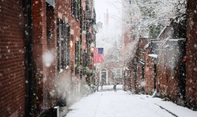 Snowy Street with American Flag