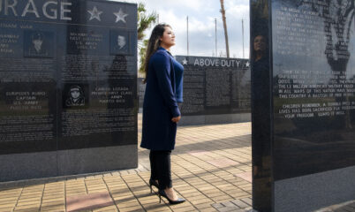 CVA My Story: Woman Observing Monument with List of KIA Soldiers