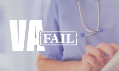 Dr. Looking at records w VA Fail logo