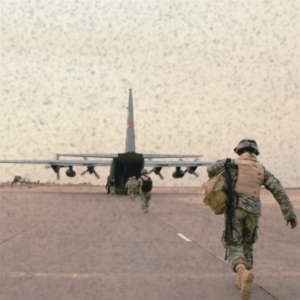 Soldiers boarding cargo plane